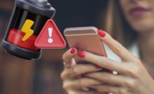 donna con smartphone e simbolo batteria